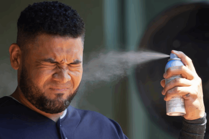 Cleveland Indians right fielder Melky Cabrera sprays sunscreen before a baseball game against the Texas Rangers, Sunday, July 22, 2018, in Arlington, Texas. (AP Photo/Sam Hodde, File)